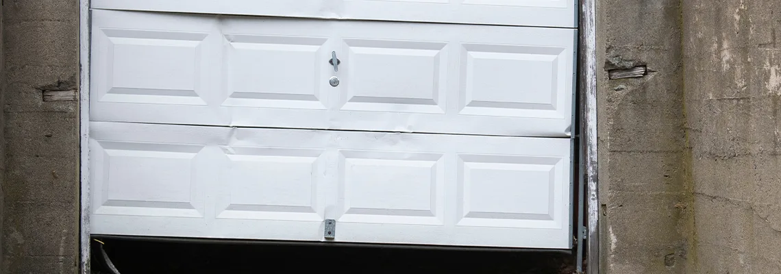 Garage Door Got Hit By A Car Dent Removal in Downers Grove, IL