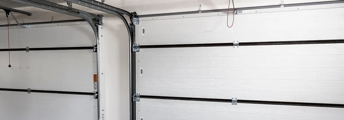 Fix Folding Garage Door Jerking in Downers Grove, Illinois