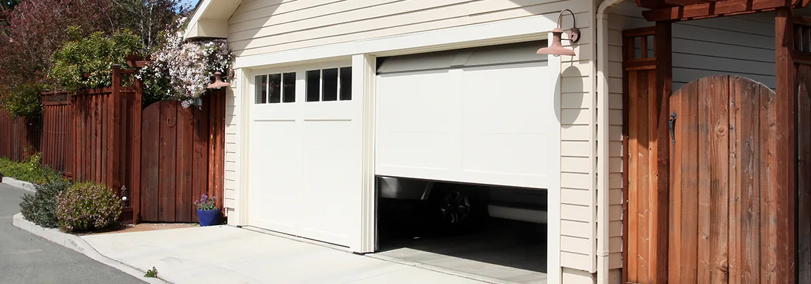 Fix Metal Garage Door Jerking in Downers Grove, Illinois